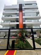Apartamento novo a 350 m da praia das Toninhas em Ubatuba - 2 dormitórios sendo 1 suite, piscina, varanda gourmet com churrasqueira, ar condicionado, cozinha completa, garagem privativa