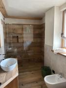 Baita PierIta Stua Genziana e Ginepro Baita PierIta Stua Genziana e Ginepro