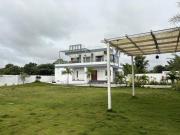NMR Nest Farms Poolside Getaway 3BHK by homeyhuts