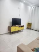 Casa ampla e nova à 400m da praia