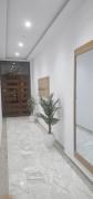 two-bedroom apartment with a living room, kitchen and balcony