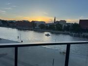 Bulwary nad Odrą Apartments z widokiem na rzekę Odrę i prywatnym miejscem parkingowym Bulwary nad Odrą Apartments z widokiem na rzekę Odrę i prywatnym miejscem parkingowym