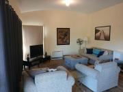 Holiday house among native trees overlooking wetlands