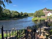 Perfect location home on the river
