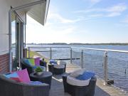 Waterfront penthouse with roof terrace and private jetty