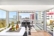 Penthouse Living with Rooftop Terrace & Sea View