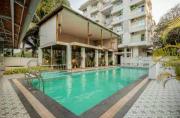 Palm View 1BHK with Pool & Café - Sazo Stays