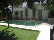 Apartamento Bizcocheros con piscina y jardín privado