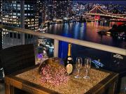 lovely 2 bedroom apartment with river view with a pool and a gym in the heart of the CBD