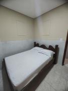 Casa de condomínio HP5 - Ar-condicionado - Ideal para turistas e empresas - 7 min de carro das praias Tupi e Ocian - 1 vaga de estacionamento