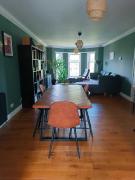 Modern Three-Bedroom Apartment in Leafy West End with Private Parking