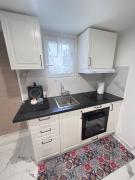 Charmant studio neuf et meublé