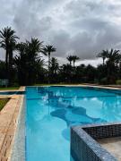 Appartement avec jardin, piscine et parking privé