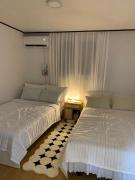 Stay in Hannam Twin Room a shared house format