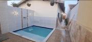 Casa com piscina e praia logo ali