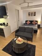 Vibrant Vision Near Airport with Coffee Maker & Wifi