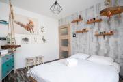 Wild and Free Urban Jungle Apartment by BookingHost