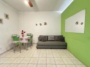 Vista lateral do Mar em Prédio pé na areia!