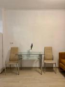 District 50 Apartment