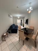 Apartamento familiar com dois quartos, ambientes climatizados, próximo a Roda Gigante de BC