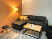 A one-bedroom apartment with a sauna near the center