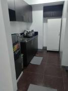 1 bedroom condo unit for 4 with balcony, pool, WIFI at Newport across NAIA T3