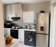 Modern Double-Story 2-Bedroom Townhouse with Private Backyard & Braai