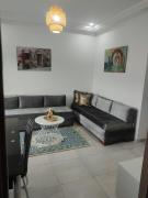 Magnifique appartement avec vue dégagée, près de laéroport et parking privé