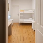 Bett im Durchgangszimmer