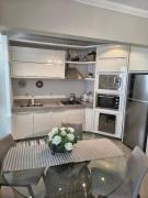 Apartamento aconchegante com ar, secadora e adega