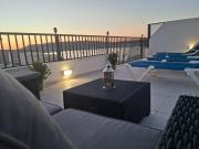 Bright Coastal Penthouse with Huge Terrace Overlooking the Sea- Ghadira Mellieha