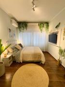 Beira-mar - Apt aconchegante com ar e Wi-Fi