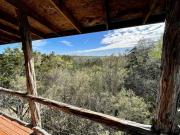 Two-Story Cabin Rental for Large Groups along Hamilton Creek in Marble Falls, Texas