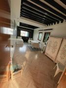 Triplex of art and serenity