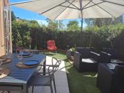 Lovely apartment with private garden and a swimming-pool