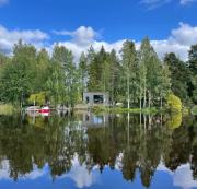 The lake house - boats, beach, sauna, dock and barbecue!