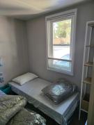 Mobilhome 6 pers 3ch 2SB 2 WC clim lave-vaisselle barbecue sous les pins