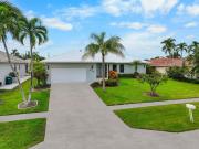 Idyllic waterfront home with pool and western exposure