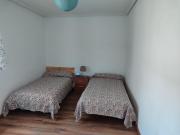 Acogedora habitación privada en piso familiar con baño compartido