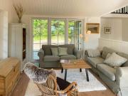 Lovely Black Wooden House Near Tisvilde Hegn