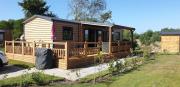 Luxe chalet JV10 Renesse met 3 slpk, 2 badk, airco, veranda en eigen parkeerplek