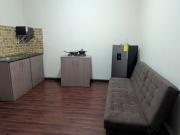 Suite Práctica de Dos Ambientes Cocina y Sofá Cama