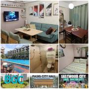 East Raya Gardens Near BGC LIBIS 2Bedroom with Veranda Netflix Internet Pool