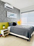 Cómodo alojamiento familiar al sur de Cancún con 2 habitaciones y cocina