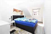 Light-Filled 2-Bedroom Attic Flat with Air Conditioning