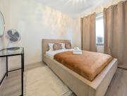 Kościańska Cosy Apartment by BookingHost