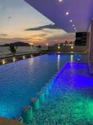 Relax with panoramic ocean and city views