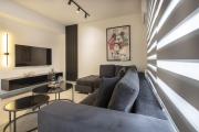Black & White 2BR Apt steps from Mavili Square