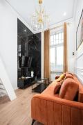 Glam apartments with mezzanine in the center by City Host