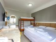 Cama em quarto pacote 7 dias Réveillon Balneário Camboriú com café incluso